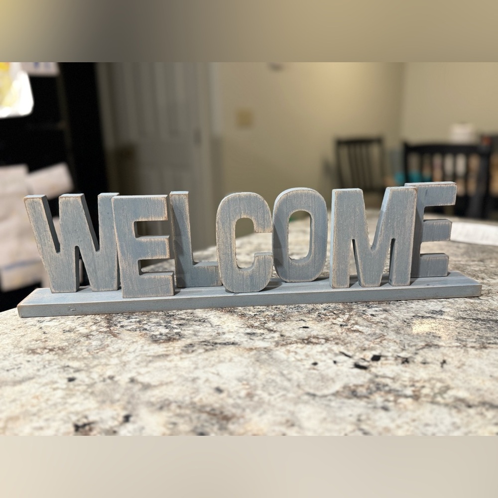 Gray Wooden Welcome Sign
